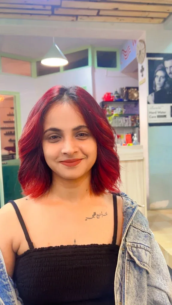 Red hair colour at Pixie Salon Jakkasandra Bengaluru