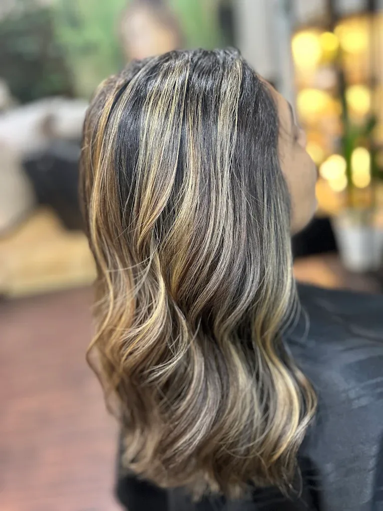 Women's blow dry styling at Pixie Salon Jakkasandra Bengaluru